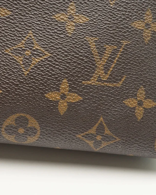 Louis Vuitton Monogram Cosmetic Pouch in Coated canvas from A Retro Tale, photo 6 of 9