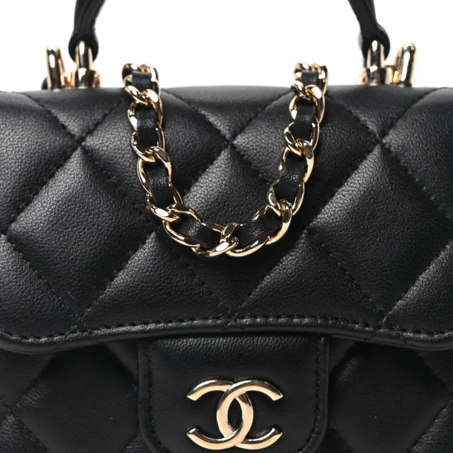 Chanel Quilted Top Handle Flap Clutch in Black Lambskin from FASHIONPHILE, photo 8 of 11