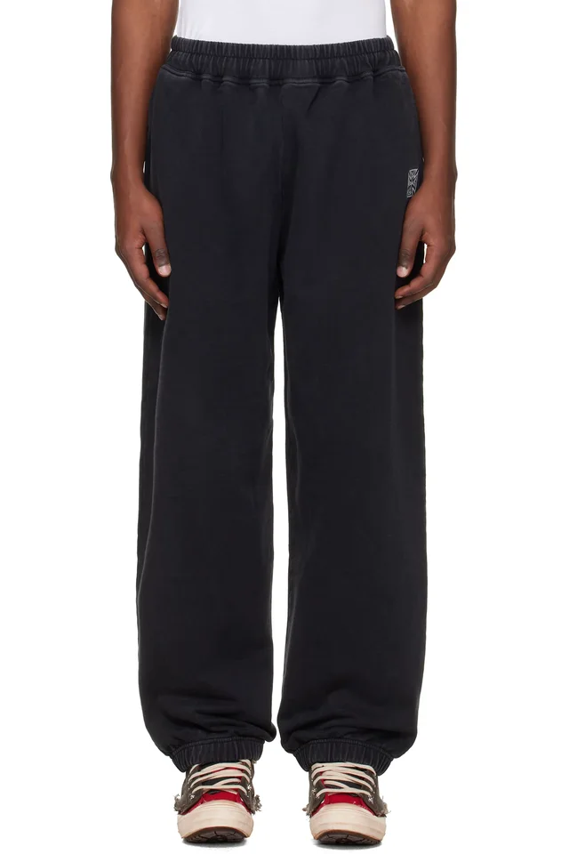 VETEMENTS Black Biker Cross Logo Sweatpants from SSENSE, photo 1 of 1