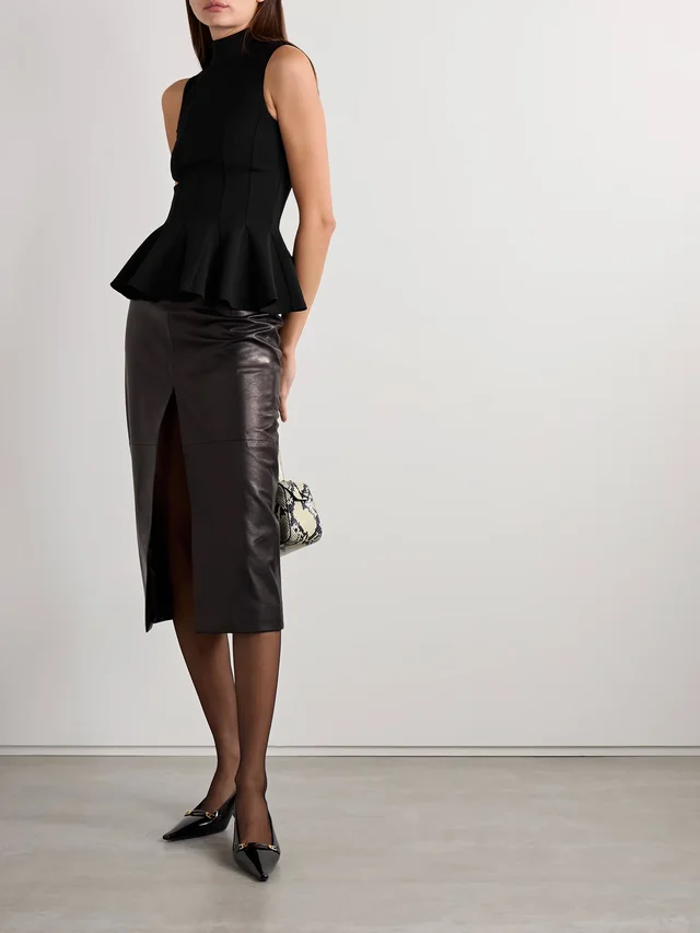 SALON 1884 Ismay paneled wool-blend peplum turtleneck top in Black, photo 2 of 2 from NET-A-PORTER (Canada)