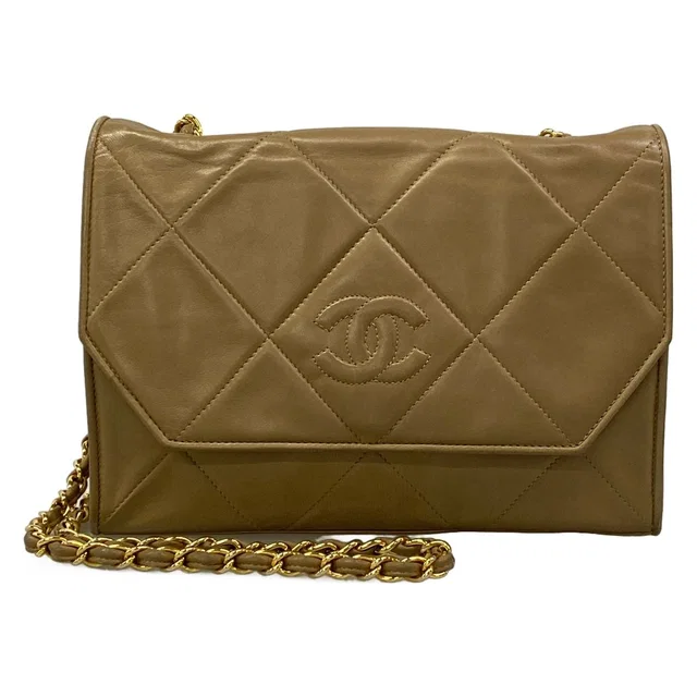Chanel Shoulder Bag Quilted Beige Chain Gold CC Logo Lambskin in Beige Lambskin from The Reluxe