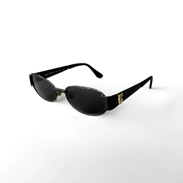 Versace Women's Round Sunglasses - Black in black from Depop, photo 1 of 1
