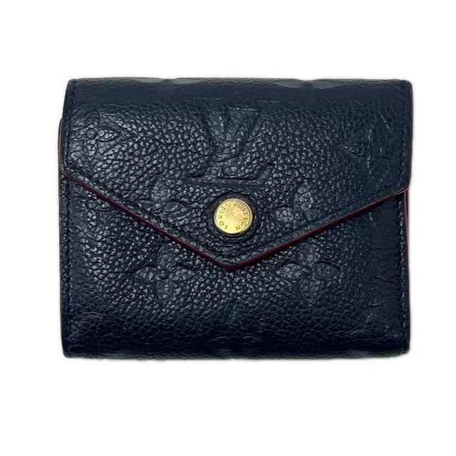 Louis Vuitton Trifold Wallet Portefeuille Victorine Monogram Empreinte Navy in Navy from The Reluxe
