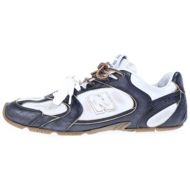 Miu Miu New Balance Leather Low-Top Sneakers Black White in Black Leather from The Reluxe