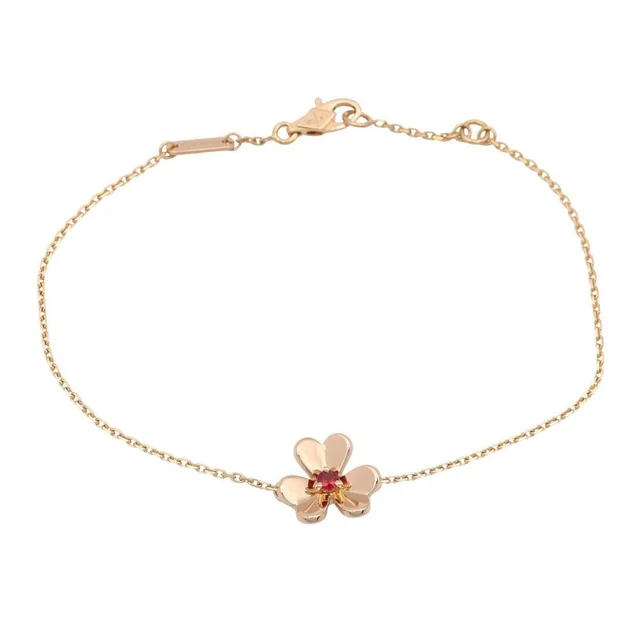 Van Cleef & Arpels 18k Gold Ruby Charm Bracelet in gold from Poshmark