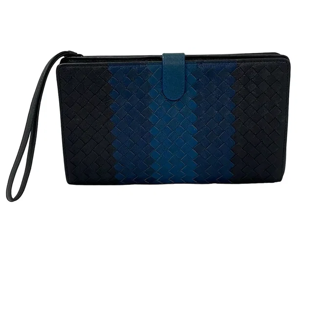 Bottega Veneta Clutch Intrecciato Dark Navy Leather in Navy Woven leather from The Reluxe