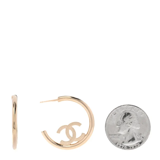 Chanel Metal Textured CC Hoop Earrings Gold in Gold from FASHIONPHILE, photo 2 of 5