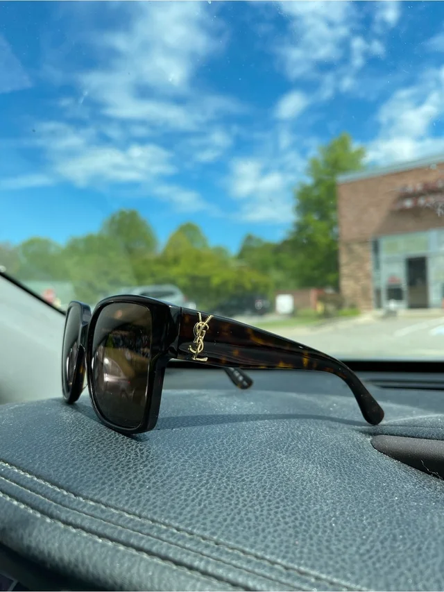 Saint Laurent Tortoise Frame Sunglasses With Gold Accents in brown|red from Poshmark, photo 2 of 5