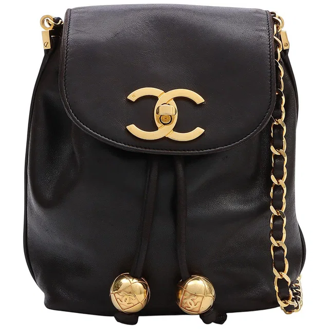 Chanel CC Turn-lock Drawstring Mini Shoulder Bag, Black, circa 1992 in Black Lambskin from VINTAGE QOO TOKYO