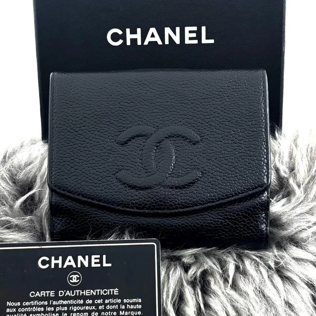 Chanel Wallet Coco Stitch Snap Caviar Bifold in Caviar leather from The Reluxe
