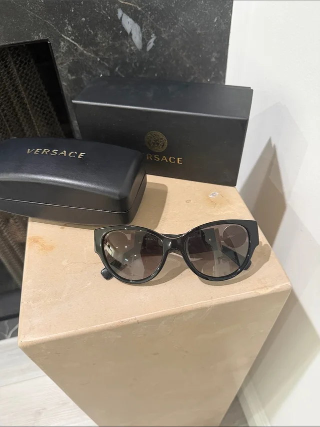 Versace Women’s Black Cat-Eye Sunglasses With Gradient Lenses in black|gray from Poshmark