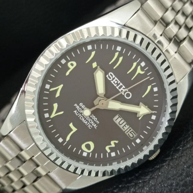 Vintage 1991 Seiko Automatic Mens Silver Watch W/Daydate & Green Accents in silver|gold|gray from Poshmark