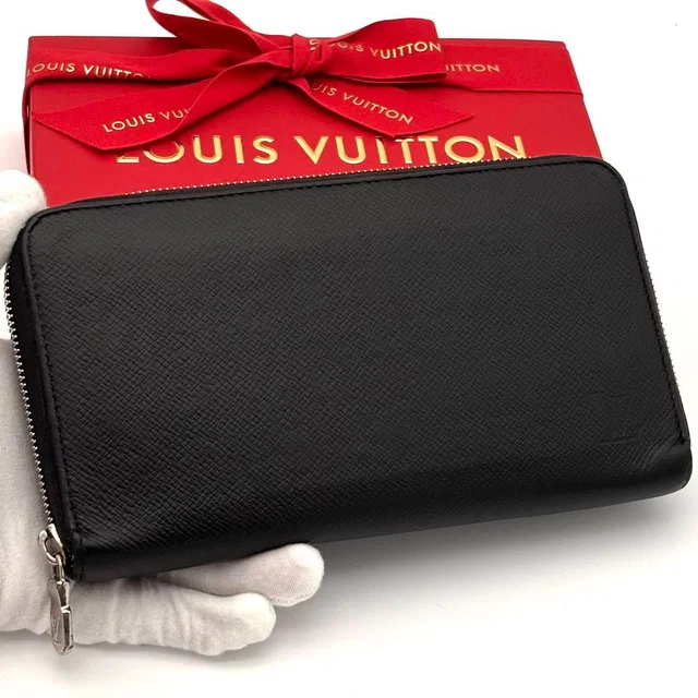 Louis Vuitton Wallet Taiga Zippy Organizer NM Black in Black from The Reluxe