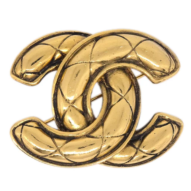 Chanel Quilted CC Brooch Pin Medium Gold 1142 in Gold from AMORE Vintage Tokyo