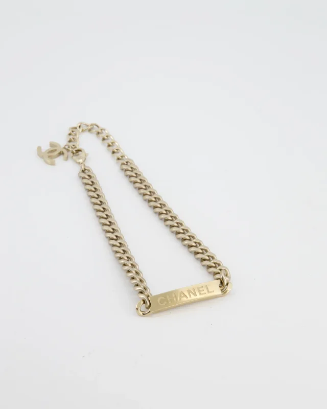 Chanel Gold Curb Link Chain Necklace with Logo Plate and CC Charm in Gold from Sellier, photo 5 of 8