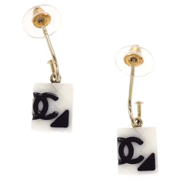 Chanel Dangle Cambon Ligne Pierced Earrings Gold White 05C in White Resin from AMORE Vintage Tokyo