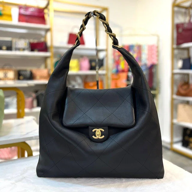 Chanel Black Shiny Calfskin Leather Maxi Hobo Bag In GHW in Black Calfskin from Luxury Promise