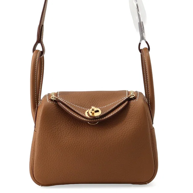Hermès Lindy Gold Taurillon Clemence Size Mini in Gold Clemence leather from GALLERY RARE
