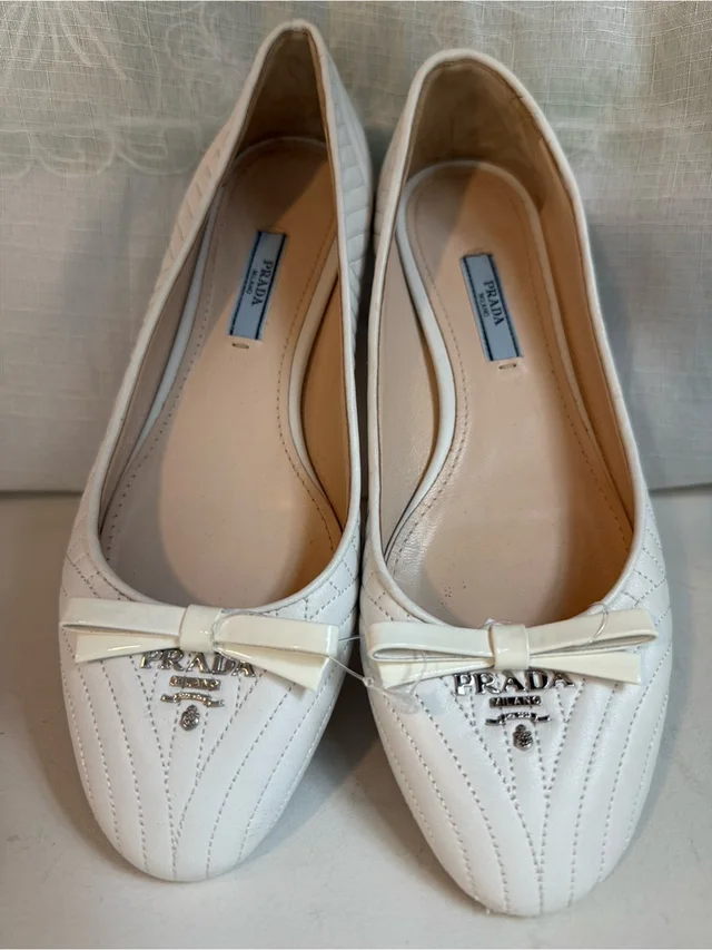 Prada Cream Quilted Leather Ballet Flats With Bow And Logo Size Eu 37.5 & Us 7 in white Leather from Poshmark