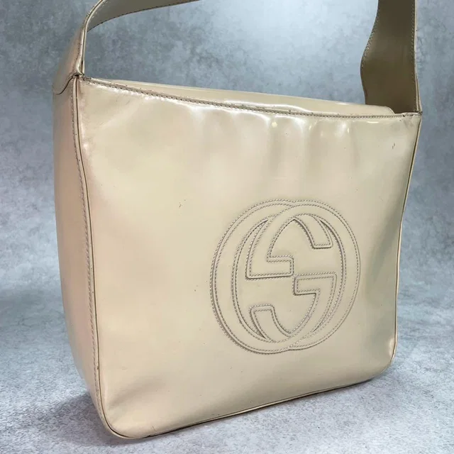 Gucci GG Shoulder Bag Patent Leather Beige Logo in Beige Patent leather from The Reluxe