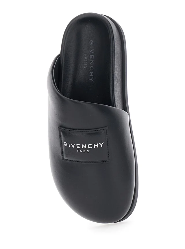 GIVENCHY Black Mules with Asymmetrical Design and Padded Leather Logo Women in Black 100% Lamb, photo 8 of 8 from Gaudenzi Boutique