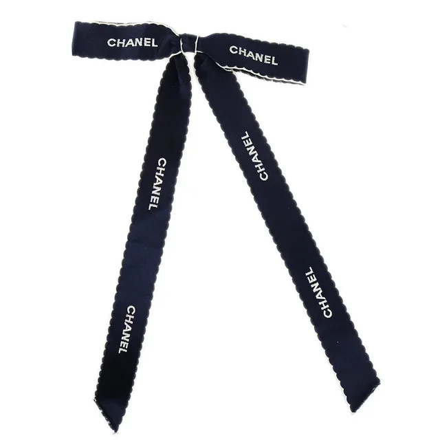 Chanel Ribbon Bow Brooch Pin Dark Navy in Navy Satin from AMORE Vintage Tokyo