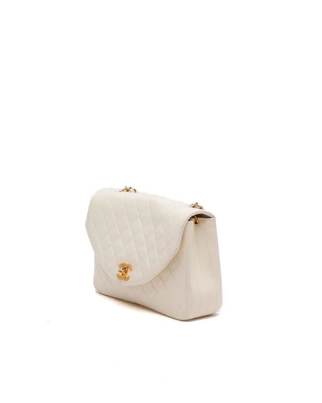 Chanel CC Half Moon Flap Bag in Woven leather from A Retro Tale, photo 2 of 2