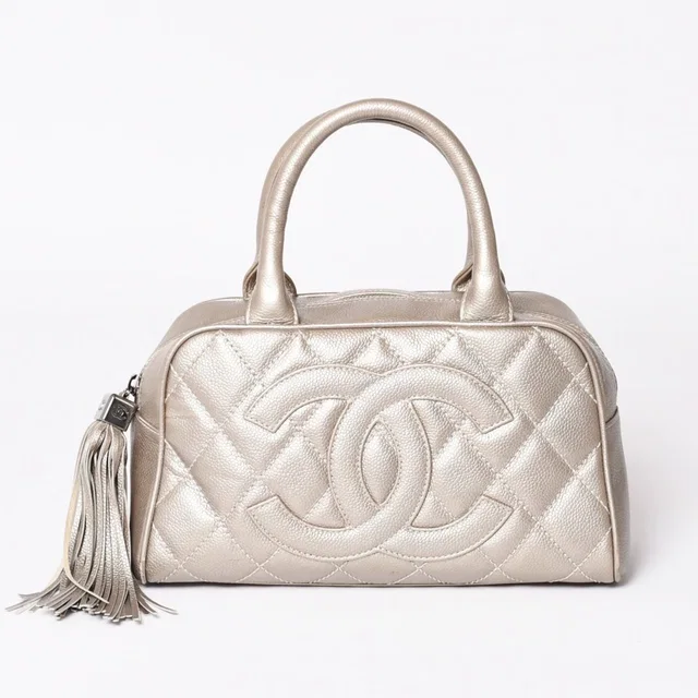 Chanel Quilted CC Logo Mini Boston Bag Caviar Leather Blanc Style Gold Silver in White Caviar leather from The Reluxe