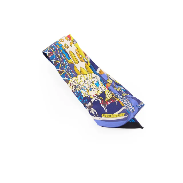 Hermès twilly explosion Universelle Silk Twilly Blue - C circle Stamp in Blue Silk from The Purse Affair