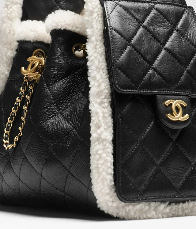 LONDON LOCATED* CHANEL 25 SMALL HANDBAG BLACK & WHITE Crumpled Shearling Sheepskin with Gold… in Black from Luxury Promise, photo 2 of 2