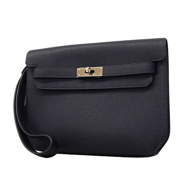 Hermès Clutch Kelly Depeches 25 Togo Blue Indigo Silver in Blue Togo leather from The Reluxe