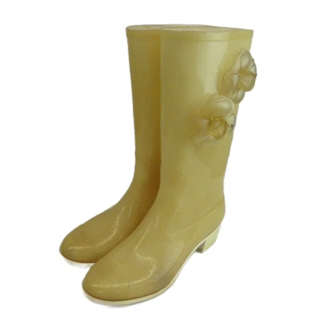 Chanel Camellia CC Logo Rain Boots Rubber Glitter Long Beige in Beige from The Reluxe