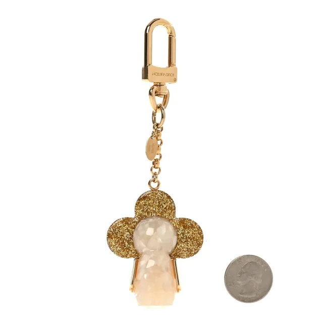 Louis Vuitton Strass Vivienne Porte Cles Charm Key Holder Gold in Gold Resin from FASHIONPHILE, photo 2 of 4