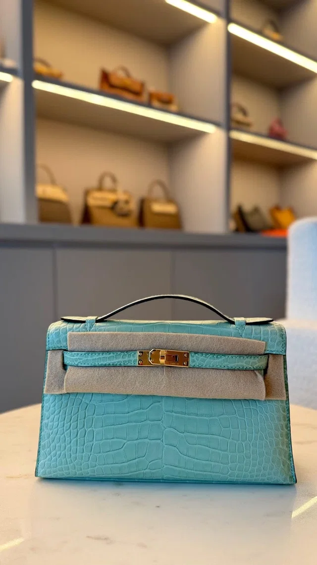 Hermès Kelly Pochette 22 Vert Deau Matte Alligator in Green Crocodile from Luxury Promise