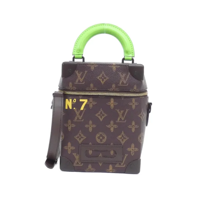 Louis Vuitton Monogram Vertical Box Trunk in Coated canvas from The Reluxe