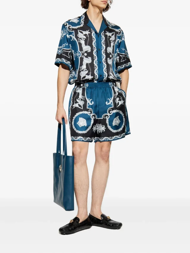 Versace Hall of Heroes print silk shorts, photo 2 of 2 from FARFETCH