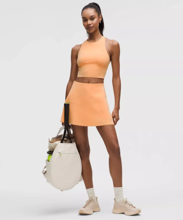 lululemon Scallop-Hem High-Neck Tennis Tank Top *Medium Support, B/C Cup in Rock Melon, photo 3 of 5 from lululemon