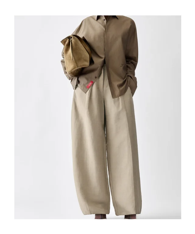 Jacquemus The Ovalo Curved Leg Pants, photo 2 of 4 from SENSER