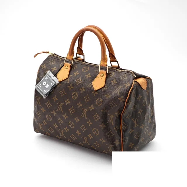 Louis Vuitton Speedy 30 Bag Handbag Mini Boston Brown Padlock Key in Brown Coated canvas from The Reluxe