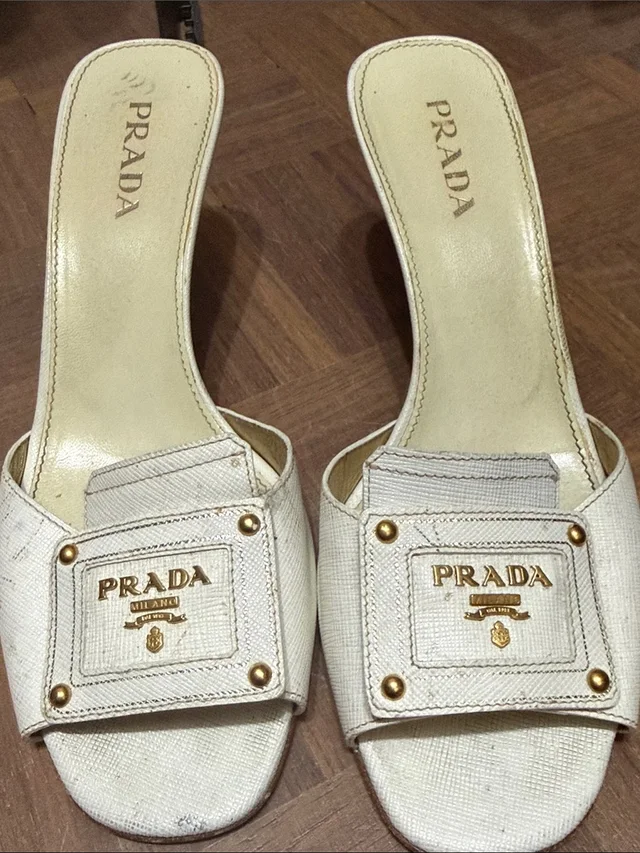 Prada Leather Open-Back Logo Mules With Gold Hardware 37.5 in white Leather from Poshmark