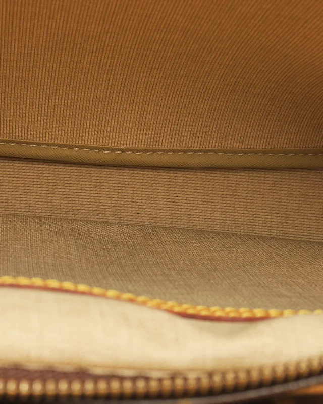 Louis Vuitton Monogram Reporter PM Crossbody Bag in Coated canvas from A Retro Tale, photo 8 of 12