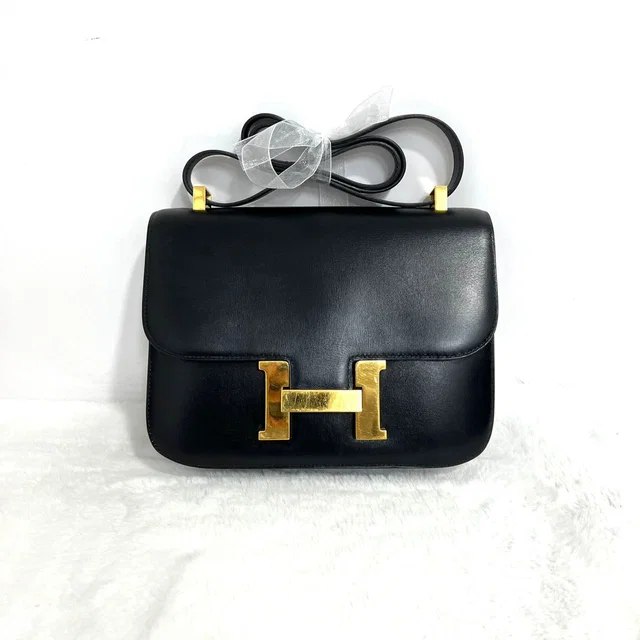 Hermès VINTAGE Black leather constance 23 shoulder bag in GHW in Black Leather from Luxury Promise