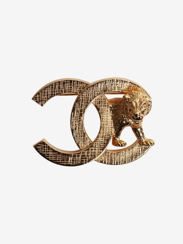 Chanel Gold CC lion brooch in Gold from Sign of the Times