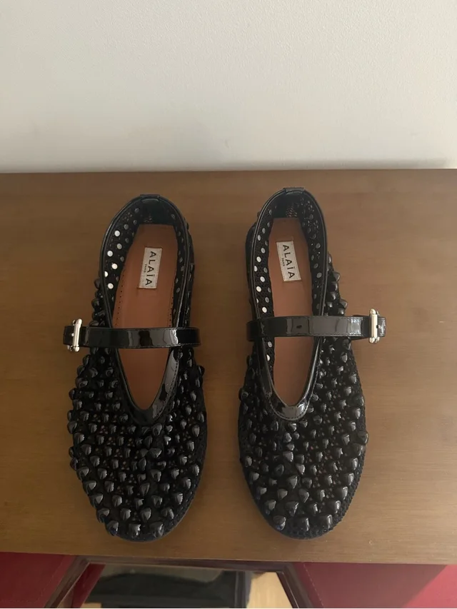 Alaïa Studded Patent Mary Jane Flats With Strap in black Patent leather from Poshmark, photo 1 of 1