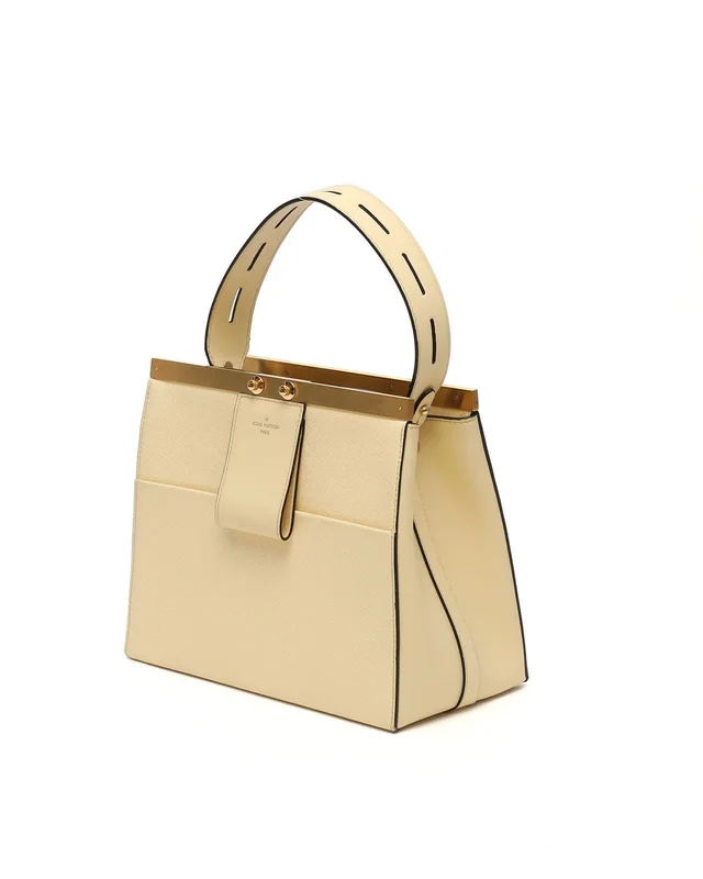 Louis Vuitton 2018s Taiga City Frame Handbag in Suede from A Retro Tale, photo 2 of 10