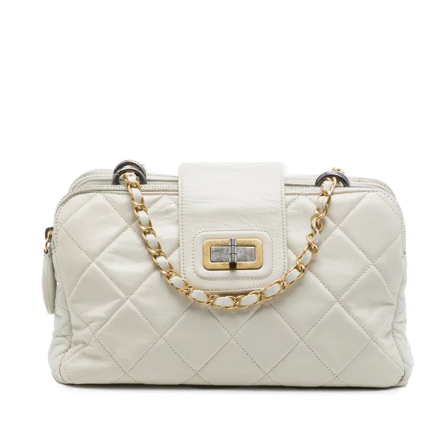 White Chanel Quilted Aged Calfskin Mademoiselle Triple Zip Shoulder Bag in White Calfskin from Designer Revival