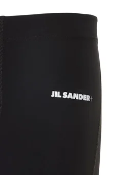 Jil Sander Skinny trousers with logo in 84% Polyamide, 16% Elastane, photo 5 of 8 from LUISAVIAROMA