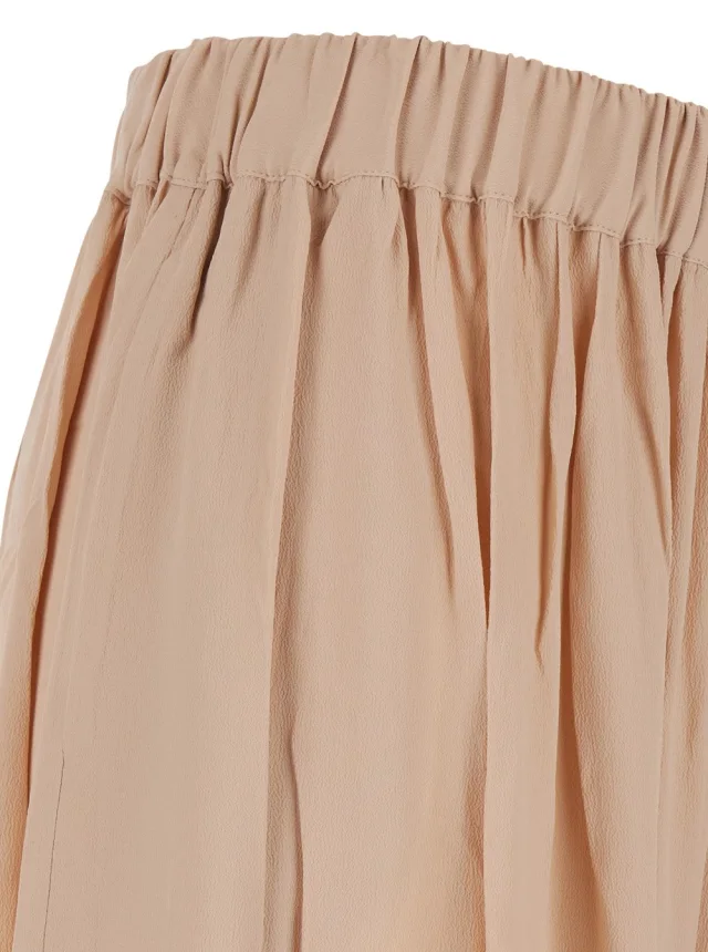 THE ANDAMANE Pink Pants with Elastic Waist and Knots at the Hems in Fabric for Women in Pink, photo 5 of 6 from Gaudenzi Boutique