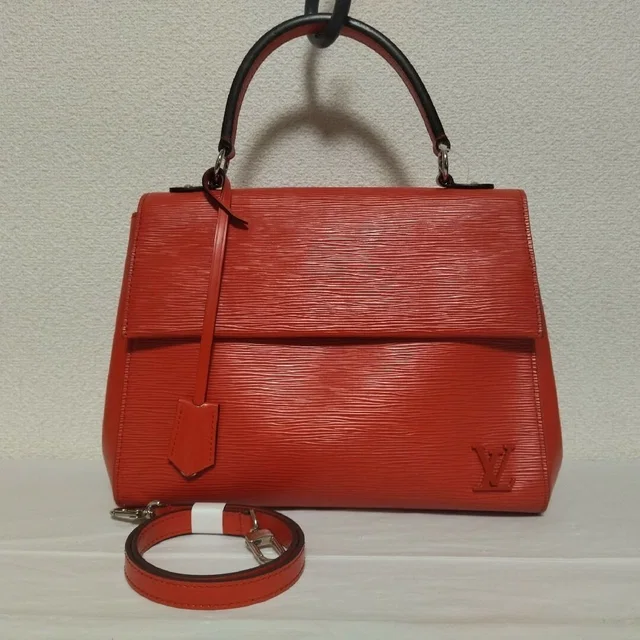 Louis Vuitton Cluny MM Epi Handbag Red in Red from The Reluxe