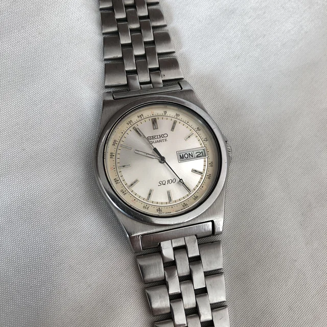 Seiko Vintage Quartz Sq 100 Day Date 35Mm Watch 7N43-8001 in Silver in silver|gray from Grailed